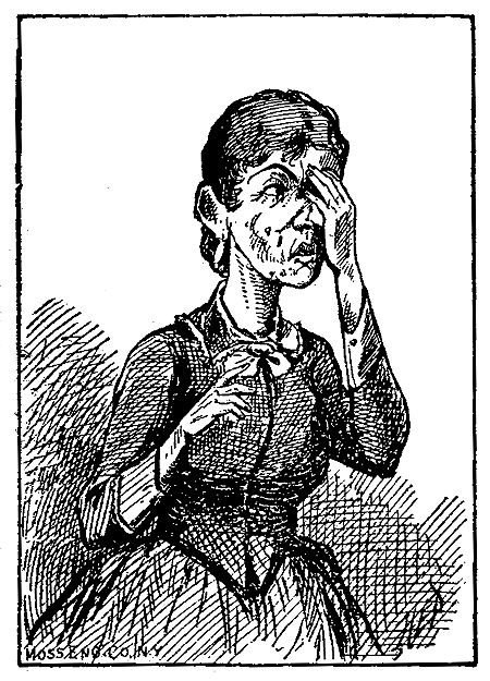 A woman holds her hand over her eye.