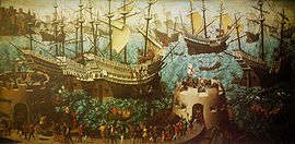 Una pequeña flota de grandes carracas, muy decorados están montando en un mar ondulado. En primer plano dos, torres fortificadas bajo erizados de cañones y soldados armados y séquito caminando entre ellos.