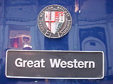 A black nameplate stating