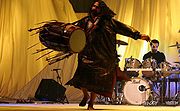 Sobrecarga Dhol Player.jpg