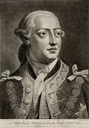 Tête-et-épaules monochrome portrait d'un jeune rasé homme portant une veste richement motifs, cravate plaine, perruque poudrée, et la chaîne de bureau ou livrée collier de l'Ordre de la Jarretière.