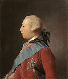 Quartier longueur portrait à l'huile d'un jeune homme, rasé de près de profil portant un costume rouge, l'étoile de Jarretière, une ceinture bleue et une perruque poudrée. Il a un menton fuyant et son front se incline loin de l'arête de son nez faisant sa tête regard de forme ronde.