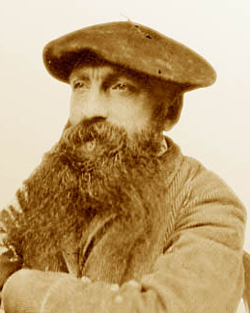 Photo de Rodin coiffé d'un béret, regardant au loin.
