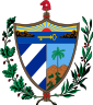 Um escudo na frente de um fasces coroadas pelo barrete frígio, todos suportados por um ramo de carvalho e uma coroa de louros